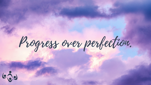 The words "Progress over perfection" in a script font over pink, blue, and purple-tinged clouds.