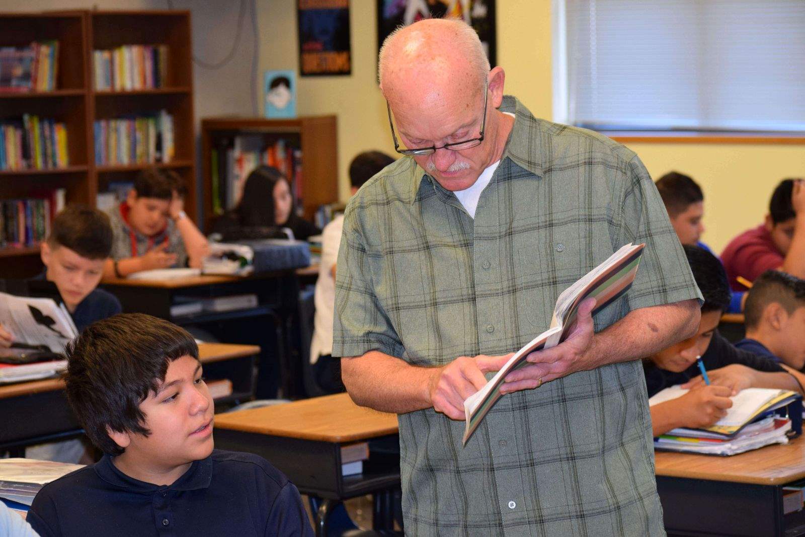 Encouraging young readers: Principal turned teacher inspires with current events